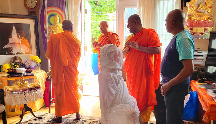 Buddha statue and sacred Bo plant at the centre